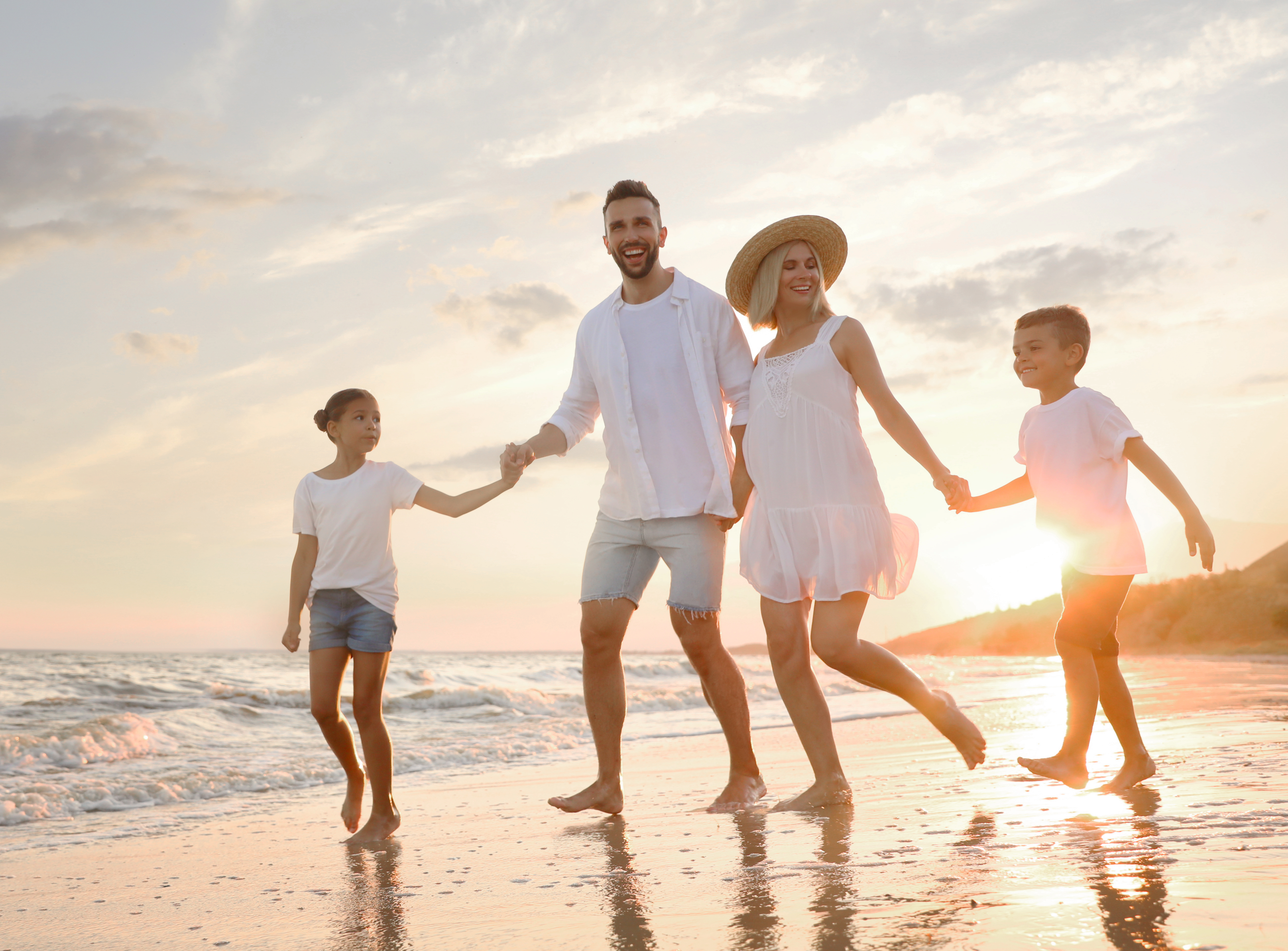 family on vacation at beach